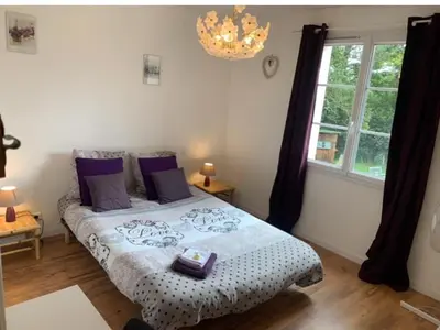 Un ou plusieurs lits dans un hébergement de l'établissement Chambre d'hôtes Sous Les Grands Chênes LOVE