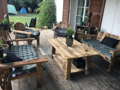 Coin salon dans l'établissement Chambre d'hôtes Sous Les Grands Chênes BOHEME