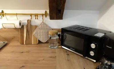 Cuisine ou kitchenette dans l'établissement La Citadelle Endormie à Ombrée d'Anjou