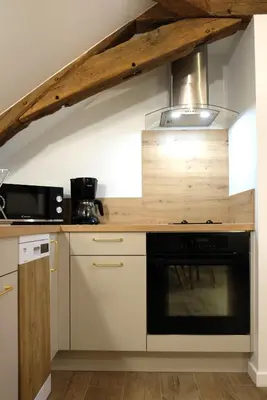 Cuisine ou kitchenette dans l'établissement La Citadelle Endormie à Ombrée d'Anjou