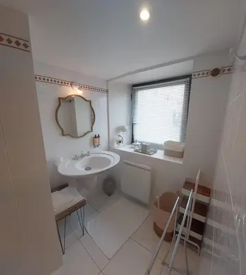 Salle de bains dans l'établissement Manoir de L'AUBINIERE