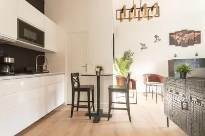 Cuisine ou kitchenette dans l'établissement L'Exotique - Hypercentre - Gare