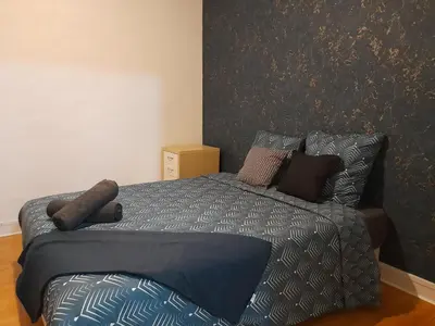 Un ou plusieurs lits dans un hébergement de l'établissement Sweet home