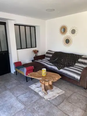 Coin salon dans l'établissement Maison familiale en bord de mer