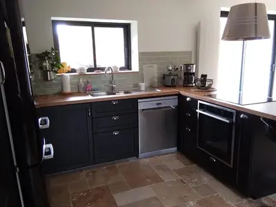 Cuisine ou kitchenette dans l'établissement L'Atelier