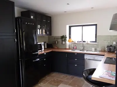 Cuisine ou kitchenette dans l'établissement L'Atelier