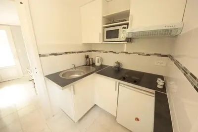 Cuisine ou kitchenette dans l'établissement Le Petit Pez