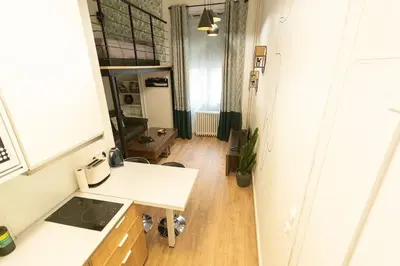 Cuisine ou kitchenette dans l'établissement La Mezzanina - Hypercentre - Gare
