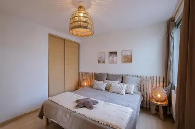 Un ou plusieurs lits dans un hébergement de l'établissement Côté Océan - Appt vue mer de 134 m2