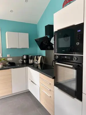 Cuisine ou kitchenette dans l'établissement Charmante maison centre