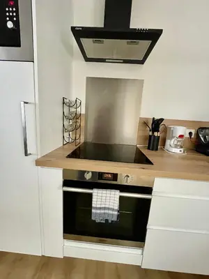 Cuisine ou kitchenette dans l'établissement La maison aux volets bleus