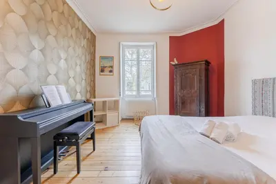 Un ou plusieurs lits dans un hébergement de l'établissement Maison Athlos - Quartier calme au coeur de Nantes