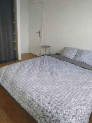 Un ou plusieurs lits dans un hébergement de l'établissement Cozy House