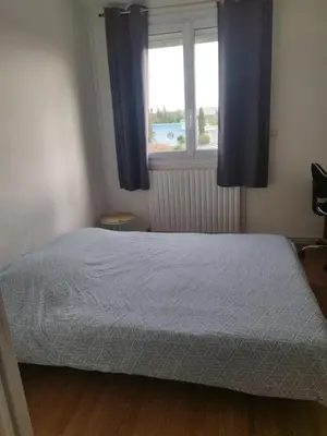 Un ou plusieurs lits dans un hébergement de l'établissement Cozy House