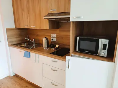 Cuisine ou kitchenette dans l'établissement La Résidence Cholet