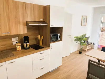 Cuisine ou kitchenette dans l'établissement La Résidence Cholet
