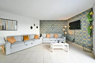 Télévision ou salle de divertissement dans l'établissement L'Instant de Sérénité Panorama et Style