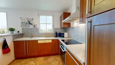 Cuisine ou kitchenette dans l'établissement Villa Emeraude - Golf & Plage