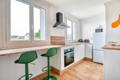 Cuisine ou kitchenette dans l'établissement Le Memphis - T2 Gare - La Bonne Marienne