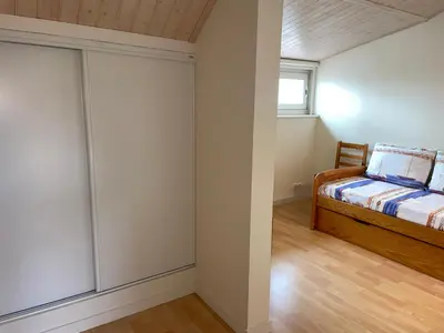 Un ou plusieurs lits dans un hébergement de l'établissement Maison spacieuse à 100m de la plage, 6 pers. - FR-1-323-557