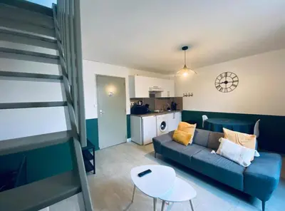 Cuisine ou kitchenette dans l'établissement Joli Duplex - centre ville - Verde