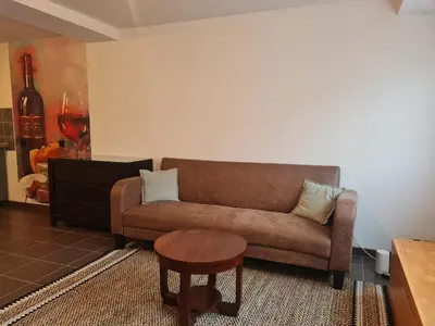 Coin salon dans l'établissement Appartement familial tout équipé - proche hôpital