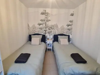 Un ou plusieurs lits dans un hébergement de l'établissement Appartement familial tout équipé - proche hôpital