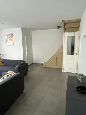 Télévision ou salle de divertissement dans l'établissement Maison de bourg