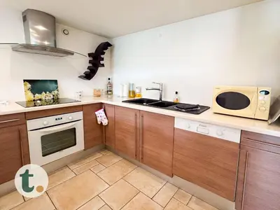 Cuisine ou kitchenette dans l'établissement Tranquiloue - Maison familiale près du PuyduFou