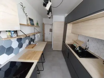 Cuisine ou kitchenette dans l'établissement T2 moderne à deux pas de la gare - avec parking