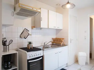 Cuisine ou kitchenette dans l'établissement Appartement quartier NEY 3 personnes