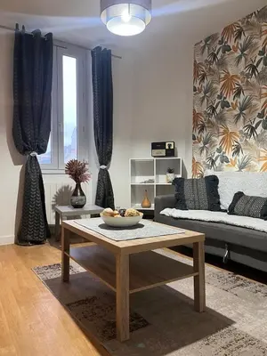 Coin salon dans l'établissement Appartement au calme 3 personnes