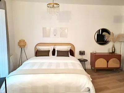 Un ou plusieurs lits dans un hébergement de l'établissement Appartement Cosy Hyper Centre