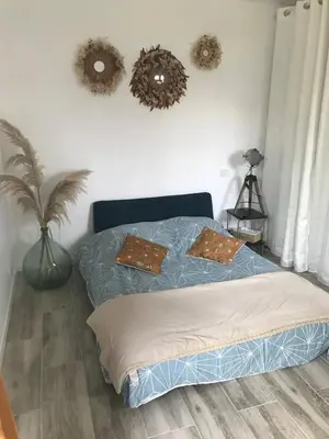Un ou plusieurs lits dans un hébergement de l'établissement Studio Tiny House