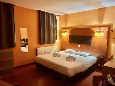 Un ou plusieurs lits dans un hébergement de l'établissement Hôtel Particulier LE MAS DES MARAIS