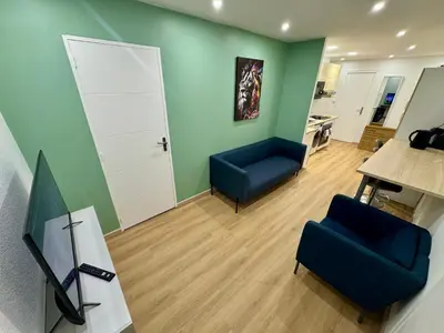Télévision ou salle de divertissement dans l'établissement York's APPART