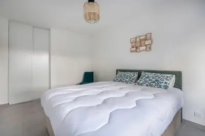 Un ou plusieurs lits dans un hébergement de l'établissement Appartement pour 4 à 150m de la Mer