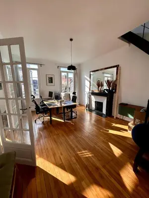 Coin salon dans l'établissement Beau Duplex plein centre avec vue, idéal télétravail