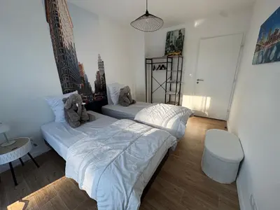 Un ou plusieurs lits dans un hébergement de l'établissement Casa Nomana 4 chambres