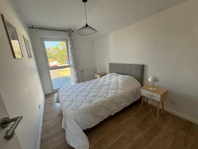 Un ou plusieurs lits dans un hébergement de l'établissement Casa Nomana 4 chambres
