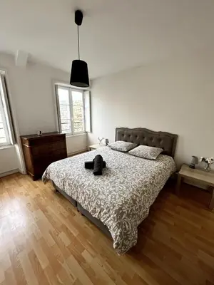 Un ou plusieurs lits dans un hébergement de l'établissement Delorme 2pers Tv & Wifi