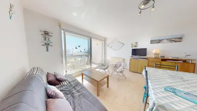 Télévision ou salle de divertissement dans l'établissement Balcon de la plage