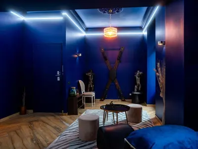 Coin salon dans l'établissement Le Voluptueux - Sauna - Jacuzzi - Centre-Ville