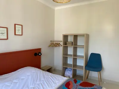 Un ou plusieurs lits dans un hébergement de l'établissement Saint Nazaire 4 chbres 15min de la plage à Saint Marc KER LOT MARC