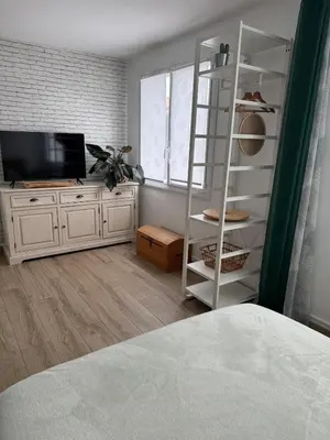 Télévision ou salle de divertissement dans l'établissement Séjournez dans un Charmant Appartement de 40 m