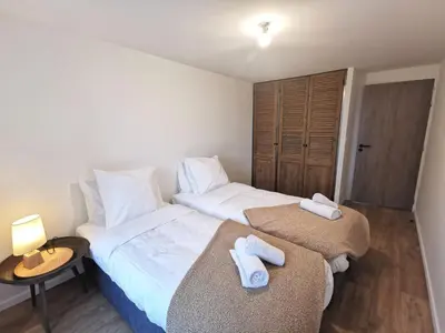 Un ou plusieurs lits dans un hébergement de l'établissement Villa Beauchêne