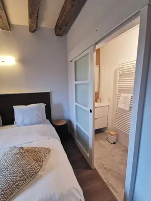 Un ou plusieurs lits dans un hébergement de l'établissement Villa Beauchêne