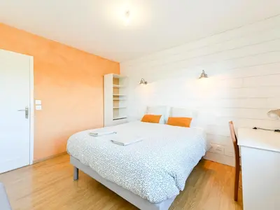 Un ou plusieurs lits dans un hébergement de l'établissement Le Cocon Perché - Ambiance Pastel et Jardin Arboré