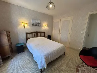 Un ou plusieurs lits dans un hébergement de l'établissement Maison cosy près plage avec jardin et parking - FR-1-224C-332