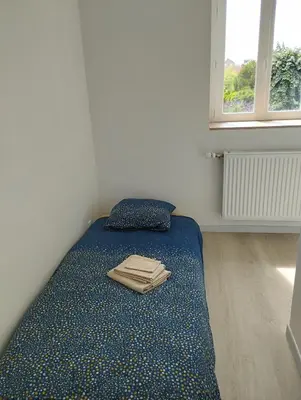 Un ou plusieurs lits dans un hébergement de l'établissement Chez Coralie et Jean